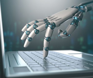 robot hand touching laptop keyboard ai