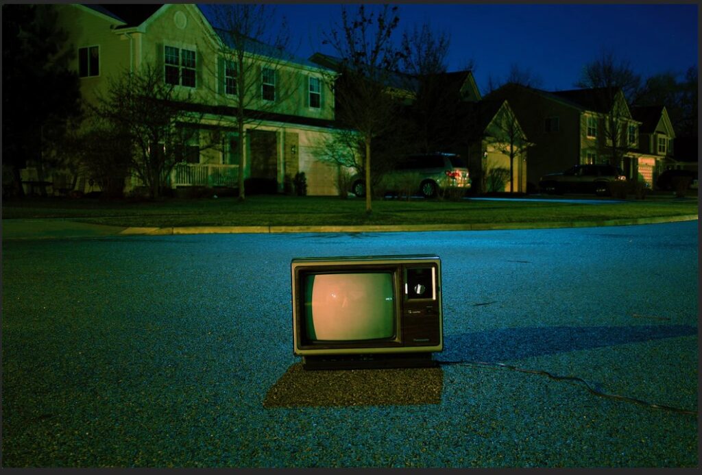 tube tv in middle of residential road