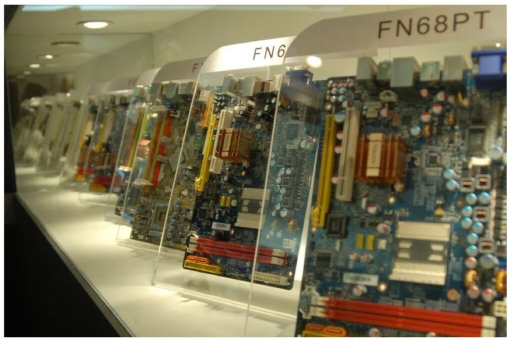 motherboards in display cases - gigabyte fn68pt