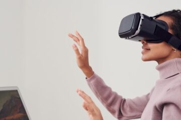 VR Headset woman hands in air