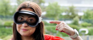 woman wearing Vision Pro googles by Apple